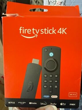 Amazon Fire TV Stick 4K - Red Packaging with Black Device
